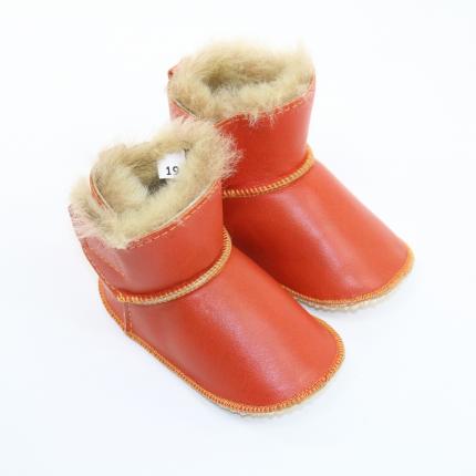 Chaussons bébé entièrement fourrés en laine agneau naturel marron et cuir orange